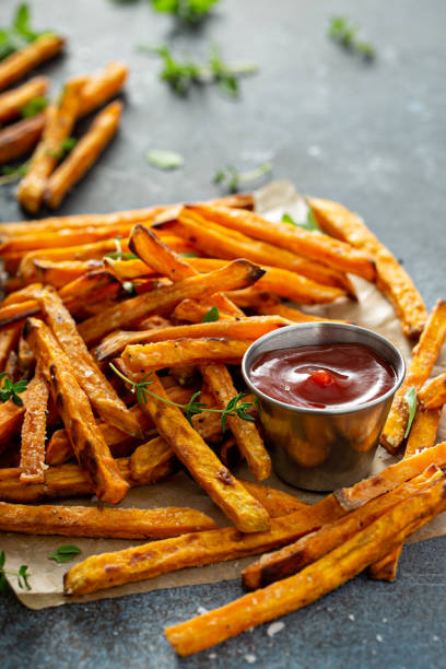 istock Sweet potato fries with sauces 1348719492