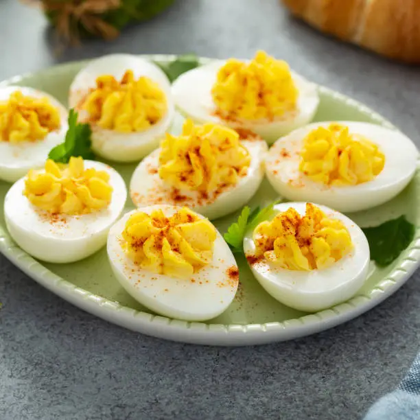 Traditional deviled eggs with paprika for Easter brunch