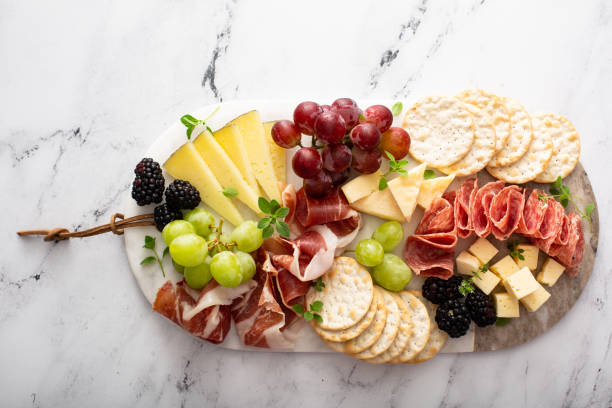 istock Charcuterie board with cheese and meat 1348719520