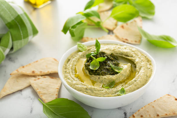istock Basil hummus topped with pesto 1348719542