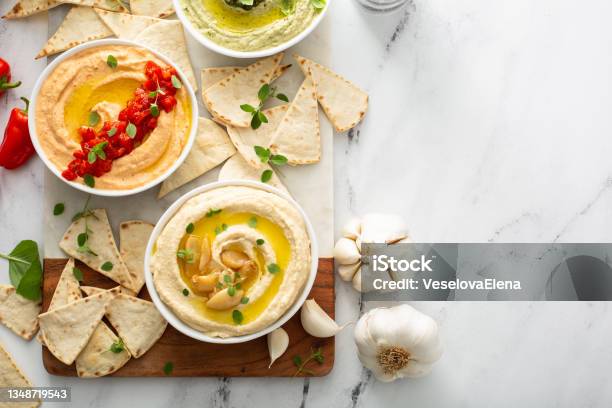 Hummus Board With Pita Stock Photo - Download Image Now - Hummus - Food, Olive - Fruit, Pita Bread