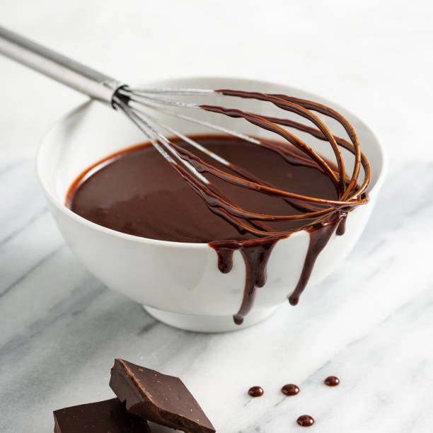 istock Making chocolate glaze or sauce 1348719551