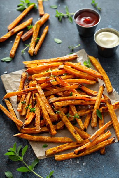 istock Sweet potato fries with sauces 1348719615