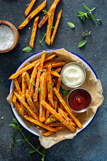 istock Sweet potato fries with sauces 1348719616