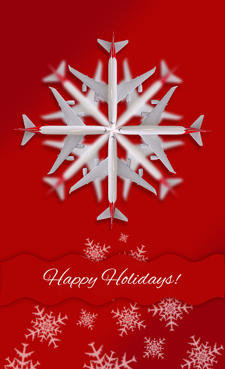 Christmas Snowflake Made of Airplanes and decorative lights against a red background. Happy Holidays and Happy New Year theme background.