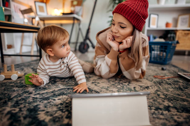 istock Mother and son playing at home 1348753097