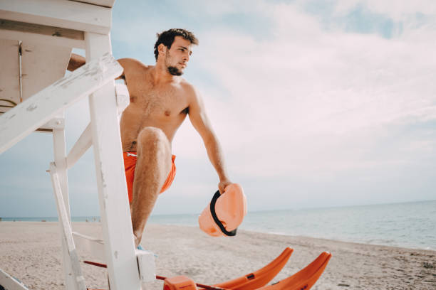 istock Rescue boat and lifeguard watching at the distance 1348754866