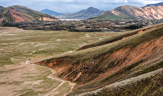 Landmannalauger is a location in the Highlands of Iceland known for its colorful volcanic rhyolite mountains, rugged lava fields and beautiful hiking trails.