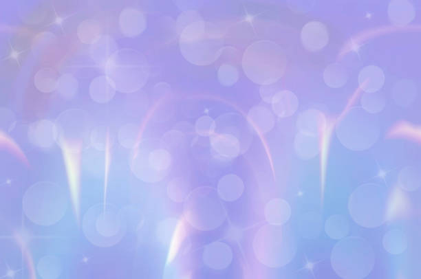 istock Abstract blue and pink background with white blurred patterns, stars, lens flares and bokeh 1348765805