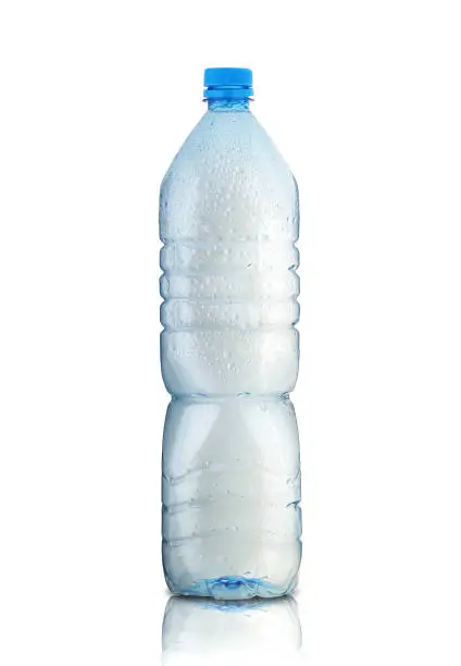 large plastic bottle with water droplets on a white background