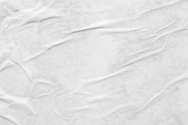 istock white crumpled and creased paper poster texture background 1348768338