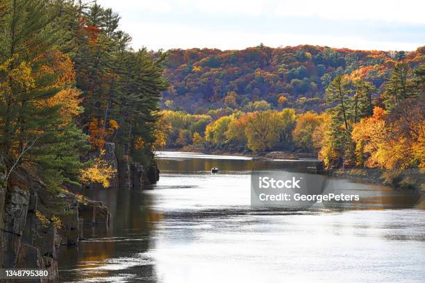 River And Cliffs With Vibrant Fall Colors Stock Photo - Download Image Now - Minnesota, Wisconsin, Maple Tree
