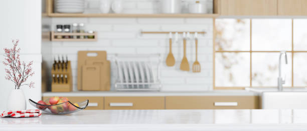 istock white granite kitchen countertop island on modern Scandinavian kitchen space. 1348814796