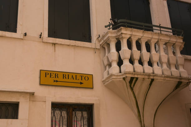 istock old balcony next typical signpost Rialto in Venice 1348817274