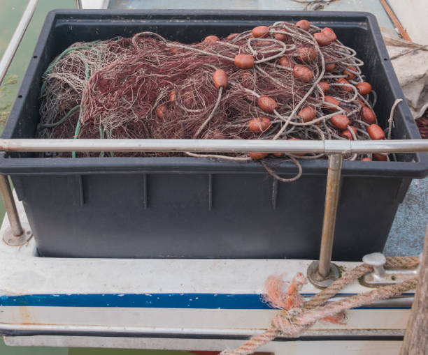 istock black tub with fishing net on boat 1348819407