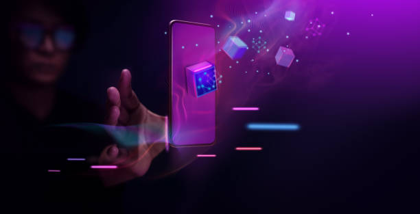 istock Metaverse and Blockchain Technology Concepts. Person with an Experiences of Metaverse Virtual World via Smart Phone 1348822032