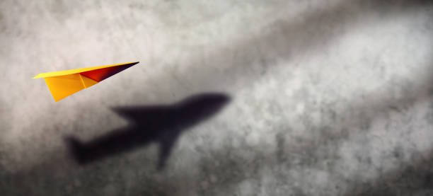 istock Think Big, Startup and Motivation Concept. Paper AirPlanes Flying Up and Shading Shadow as Aircraft 1348822042
