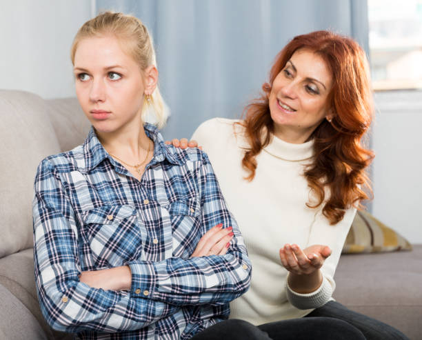istock Mature mom apologizes to daughter after quarrel 1348836790