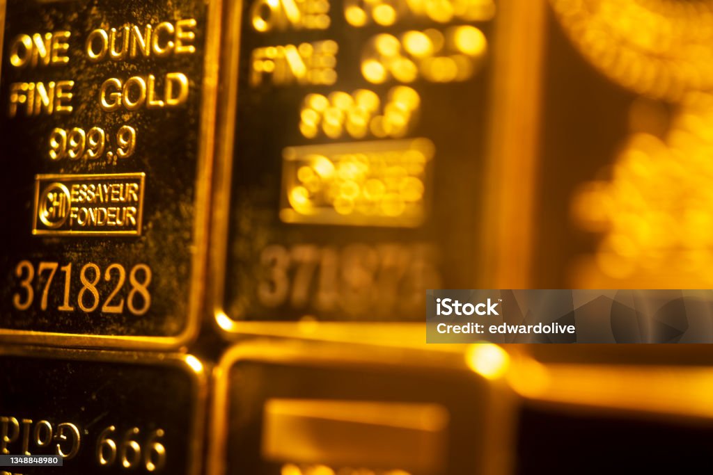Solid pure 999.9 gold bullion ingot bars photo Solid pure 999.9 gold bullion ingot bars photo. Ingot Stock Photo