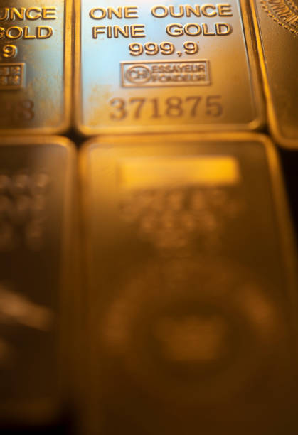 istock Solid pure 999.9 gold bullion ingot bars photo 1348848995