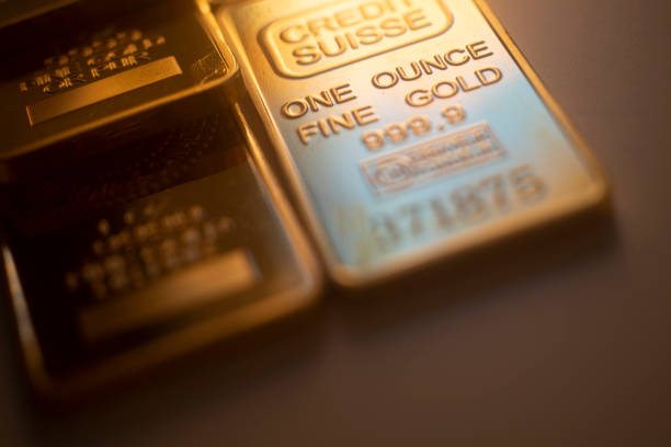 istock Solid pure 999.9 gold bullion ingot bars photo 1348849017
