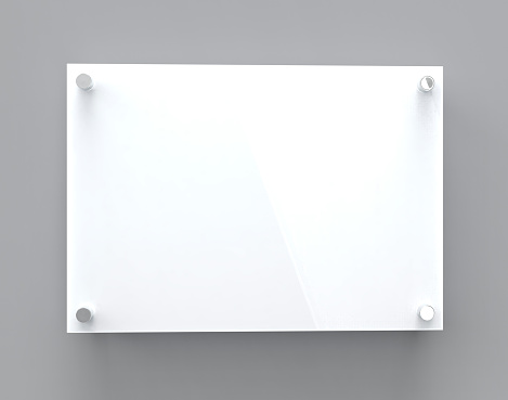 A4 white glass nameplate plate on spacer metal holders. Clear printing board for branding. Acrilic advertising signboard on graybackground front view. Size 297 x 210 mm. 3D illustration