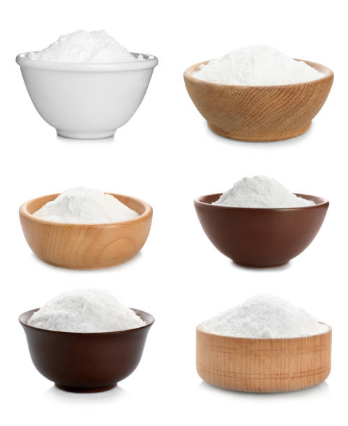 istock Set with bowls of baking soda on white background 1348853638