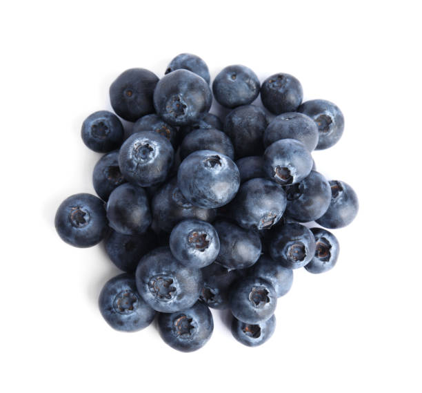 istock Fresh ripe blueberries on white background, top view 1348853717