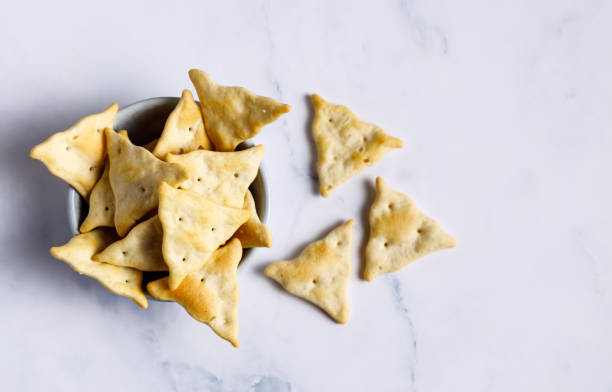 Salty crackers in a small bowl.