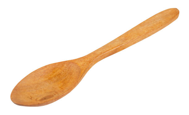 istock Wooden spoon isolated on a white background. 1348859902