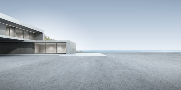 istock 3d render of futuristic concrete architecture with car park, empty cement floor. 1348861769