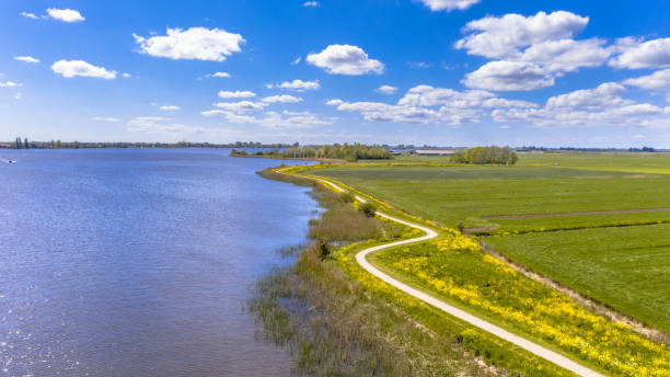 istock Aerial Springtime scene of dutch river 1348862922