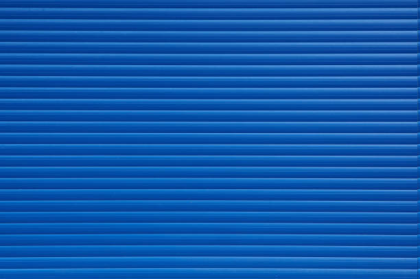 istock Textured background of blue wall with lines 1348863050