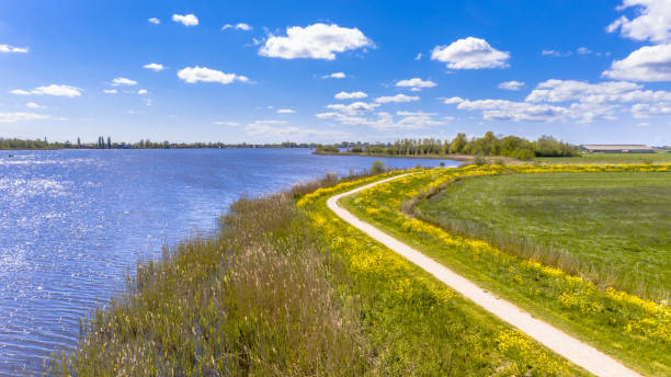 istock Aerial Springtime scene of dutch river 1348863297