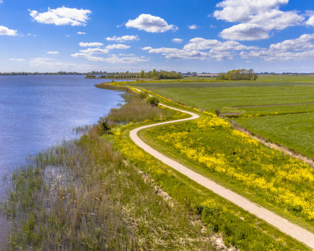 istock Aerial Springtime scene of dutch river 1348865476