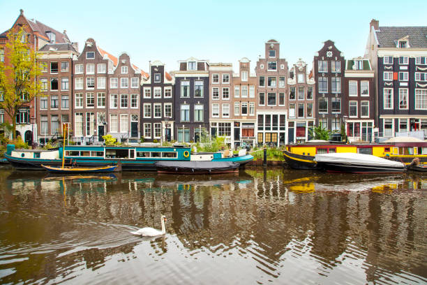 istock Singel canal in Amsterdam old town, Netherlands 1348865940