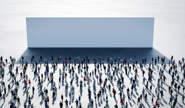 istock Crowd of people in front of big white wall 1348869850