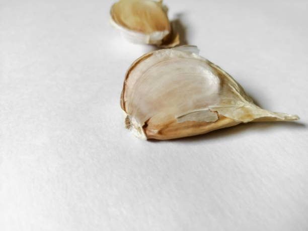 istock Garlic close-up, cloves and in the background another 1348870244