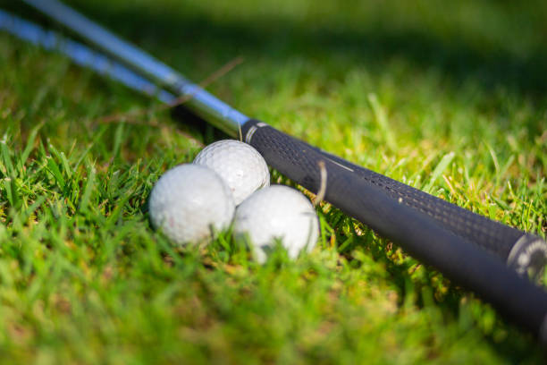 istock Golf clubs and balls, selective focus 1348870309