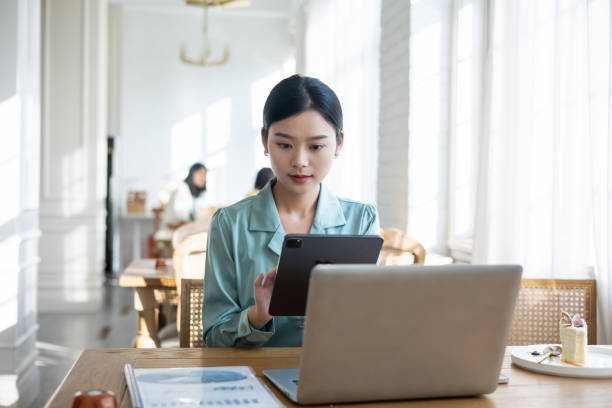 istock Young businesswomen working with Digital Tablet 1348871673
