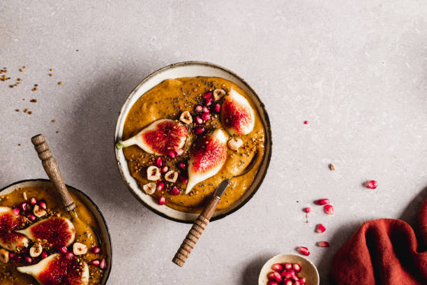 Top view of a healthy smoothie bowl on kitchen