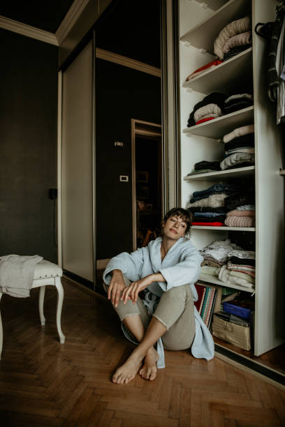 istock Just finished with placing clothes in the closet 1348899952