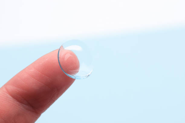 istock contact lenses on the finger on blue background 1348906628