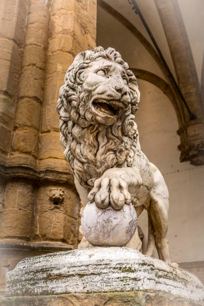 Florence, Italy lion statue at the Loggia dei Lanzi in Palazzo Vecchio. Lion Medici, Firenze landmarks