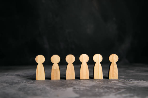 istock wooden people sign on grey background 1348918930