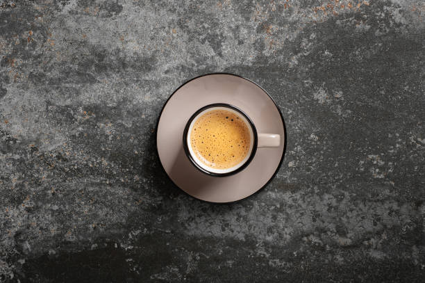 istock cup of coffee with beautiful foam on a concrete background top view copy space 1348922276