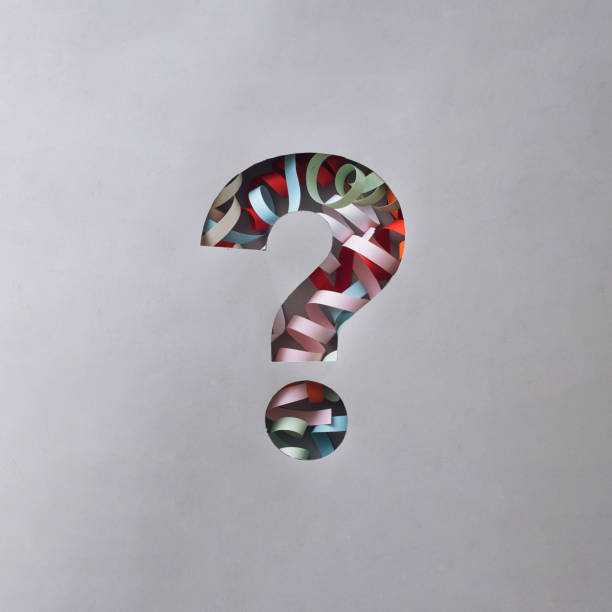 istock Festive question mark cutout with twirled party streamers 1348933045