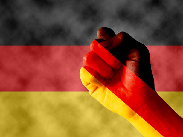 It combines the German flag  and fist, tells the concept of communication and dialogue It combines the German flag  and fist, tells the concept of communication and dialogue 抽象 stock pictures, royalty-free photos & images