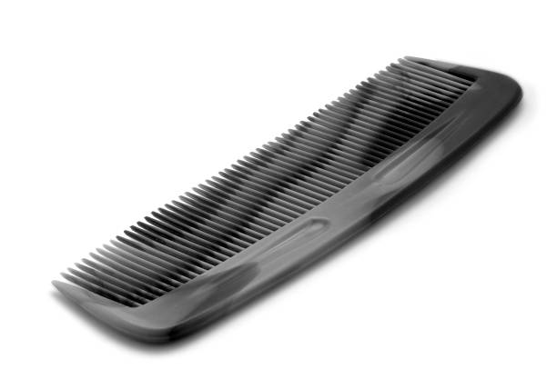 istock black comb isolated on a white background. Close up 1348936176