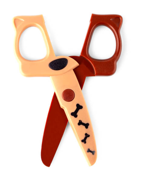 istock close up children's brown scissors isolated on white background 1348936256